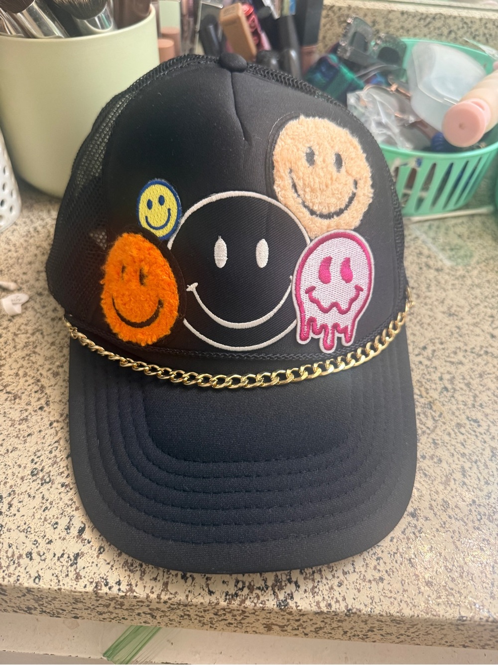 Otto Black Trucker Cap with Smiley Patch Cluster & Gold Chain